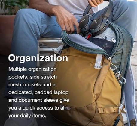 Commuter packing headphones into the Osprey Nebula backpack's organization pockets and padded laptop sleeve
